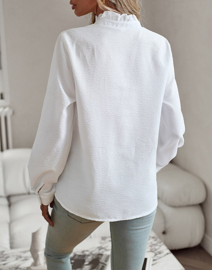 Edith | Elegant blouse with romantic ruffles