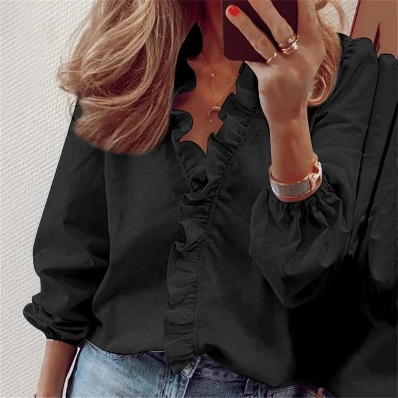 Enola | Charming blouse with playful ruffles