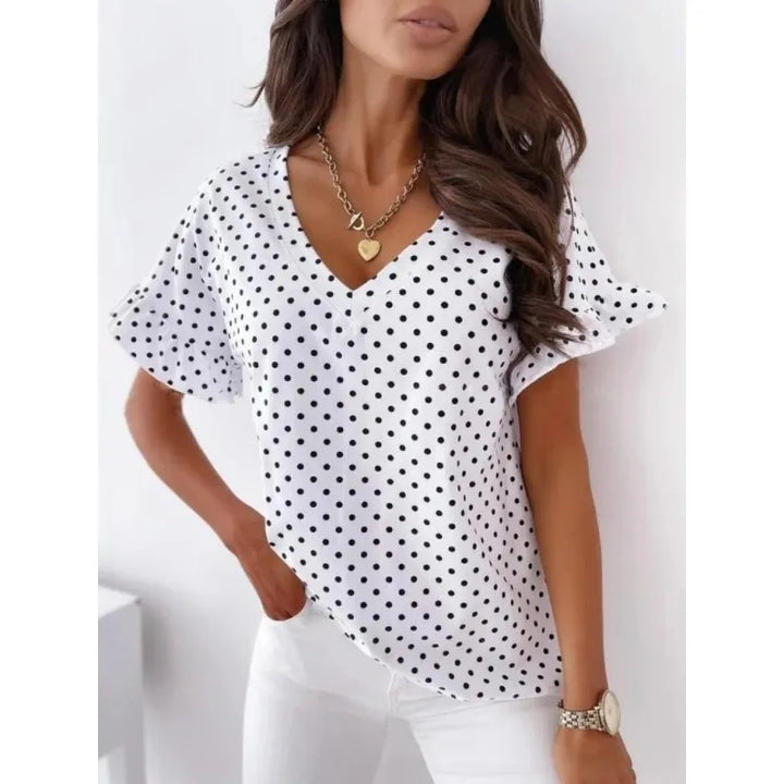 Velia | Charming blouse with polka dot print