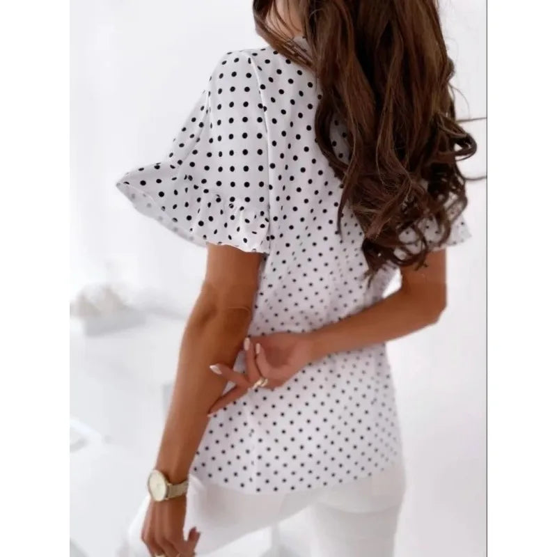 Velia | Charming blouse with polka dot print