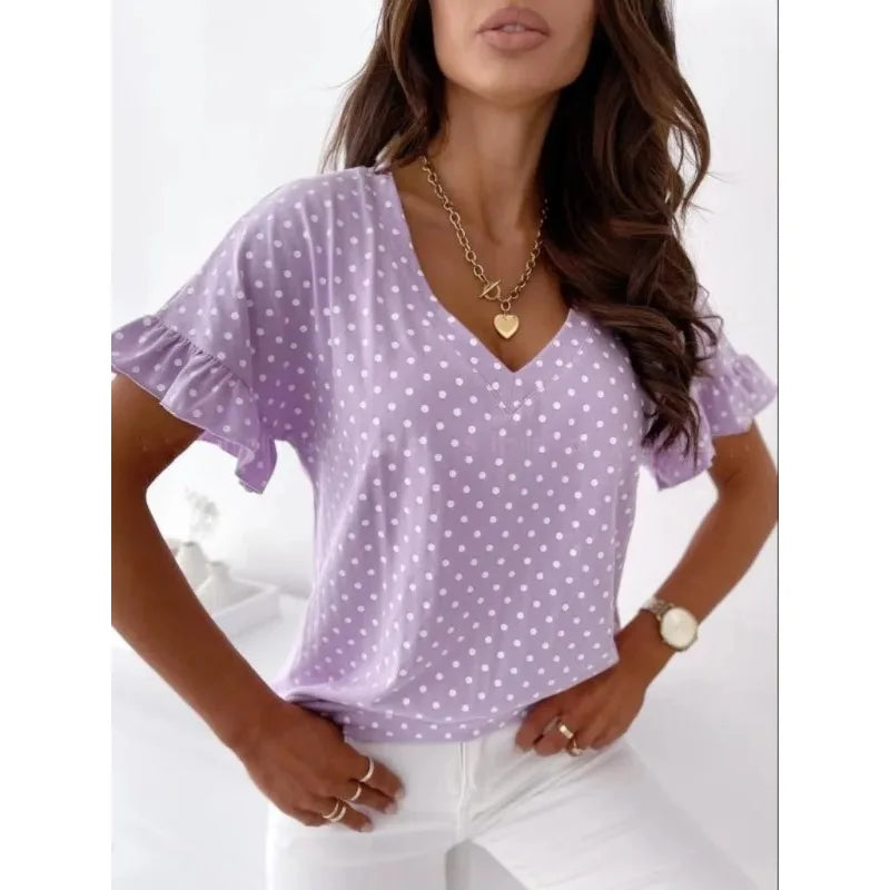 Velia | Charming blouse with polka dot print