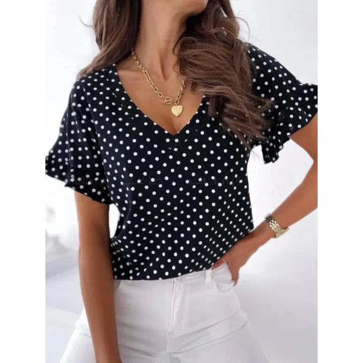 Velia | Charming blouse with polka dot print